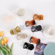 8字形鸭嘴夹，材质塑料。寻找能包工包料的